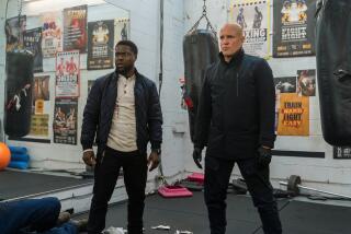 Kevin Hart and Woody Harrelson  in “The Man From Toronto”