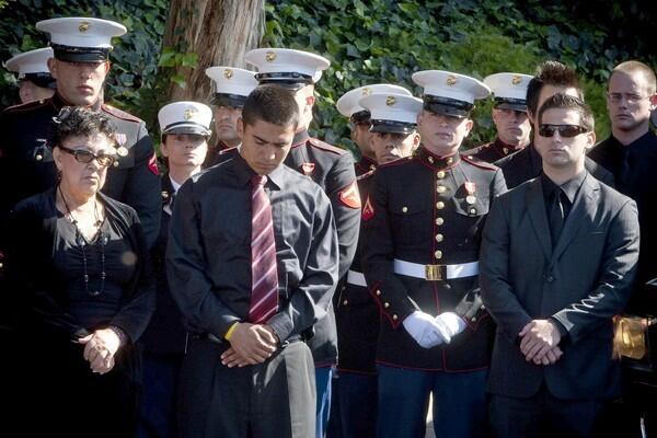 Family members and fellow Marines grieve during funeral services at St. Martin De Porres Roman Catholic Faith Community Church in Yorba Linda for Marine Corps Reserve Lance Cpl. Rick J. Centanni, 19, of Yorba Linda, who was killed March 24 when his armored vehicle struck a roadside bomb in Afghanistan.