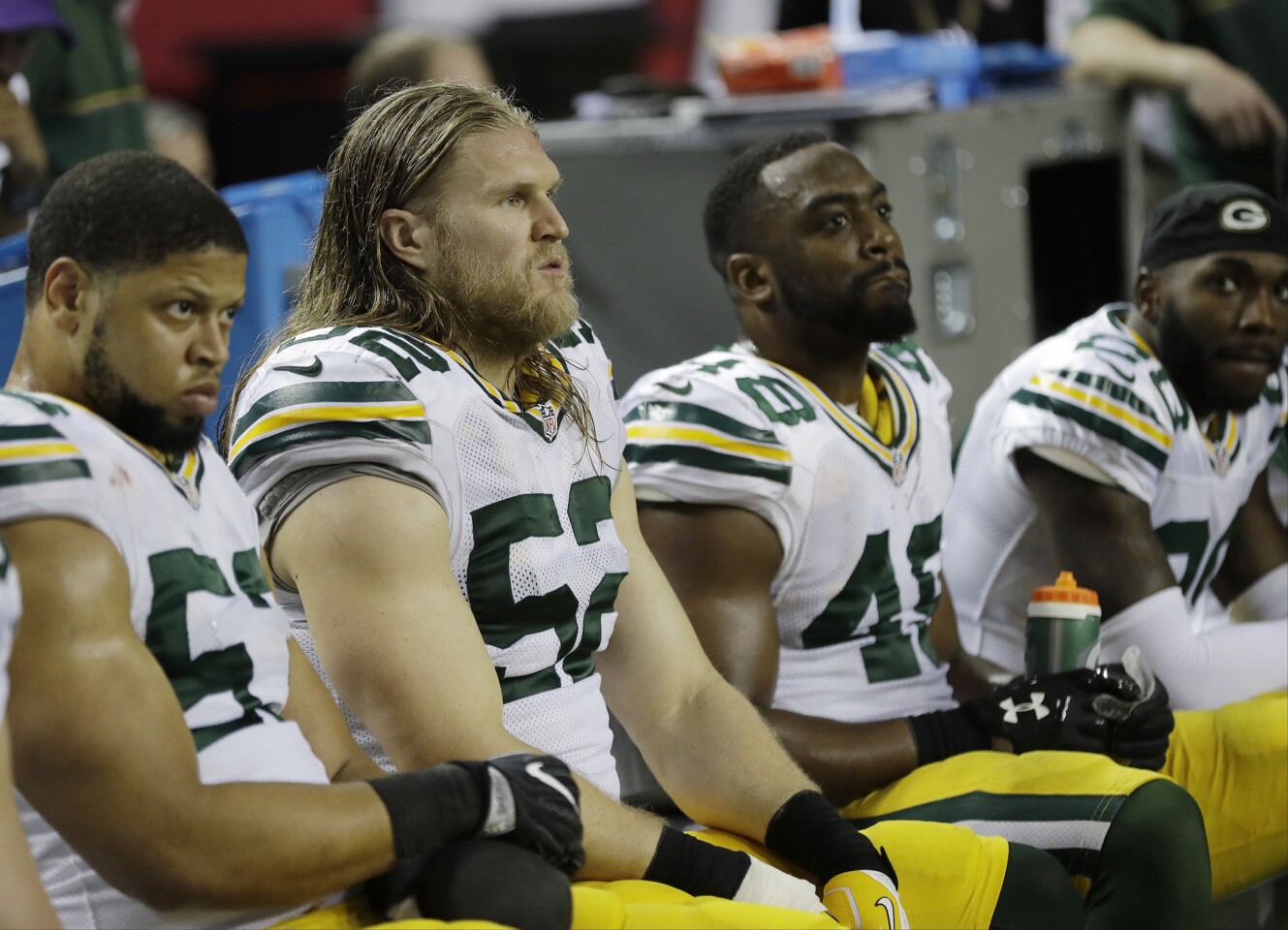 Green Bay Packers players watch play from the bench during the second half of the NFL football NFC championship game against the Atlanta Falcons, Sunday, Jan. 22, 2017, in Atlanta. (AP Photo/David J. Phillip)
