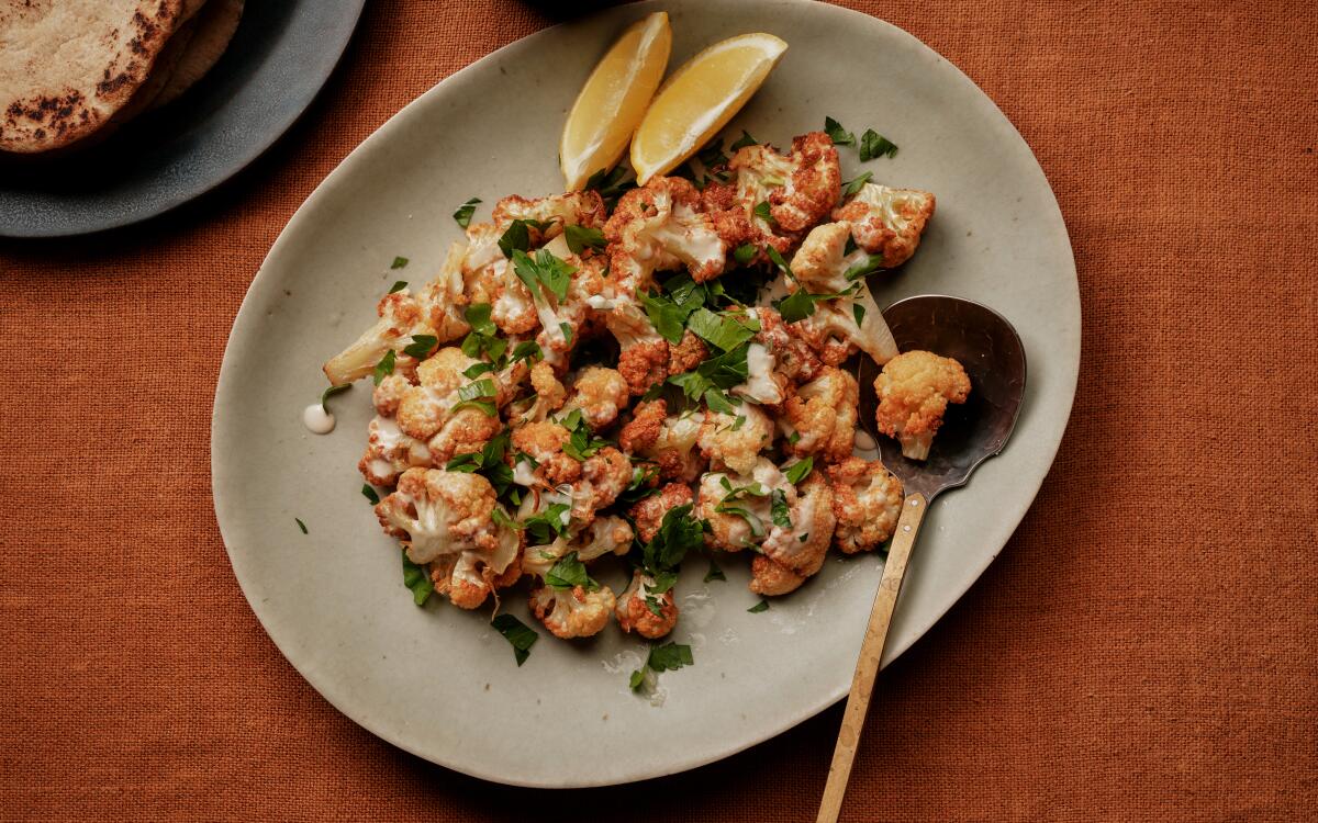 Cookbook author Hawa Hassan's Lebanese fried cauliflower with tahini sauce at the L.A. Times test kitchen.