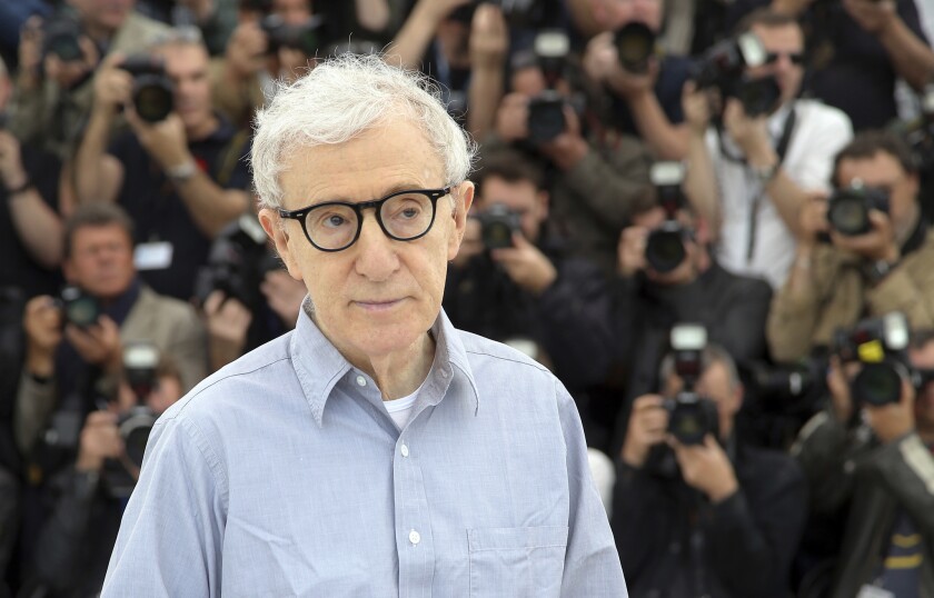 Director Woody Allen poses for photographers during a photo call.