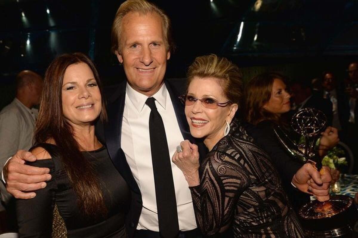 Marcia Gay Harden, left, Jeff Daniels, Jane Fonda and Daniels' best actor Emmy Award attend HBO's post party at the Pacific Design Center.
