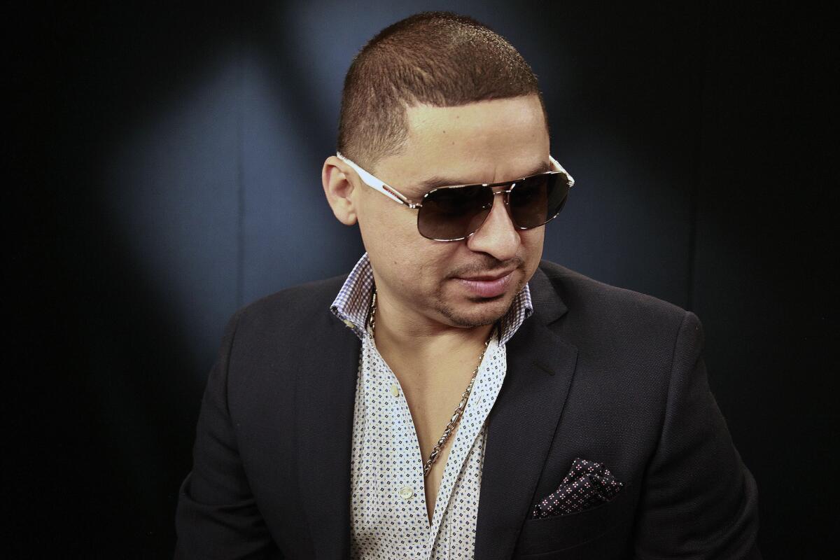 Mexican singer Larry Hernandez poses for a photo during an interview in Los Angeles.