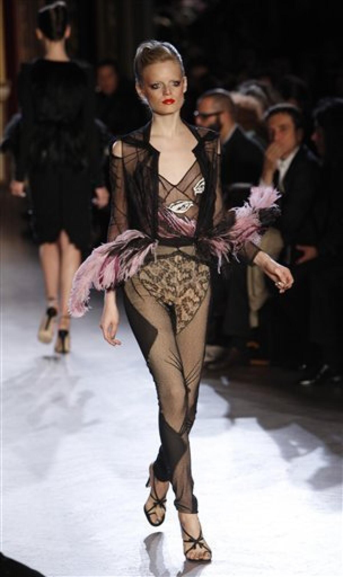 Model Carmen Kass on the runway at the Lanvin fashion show during