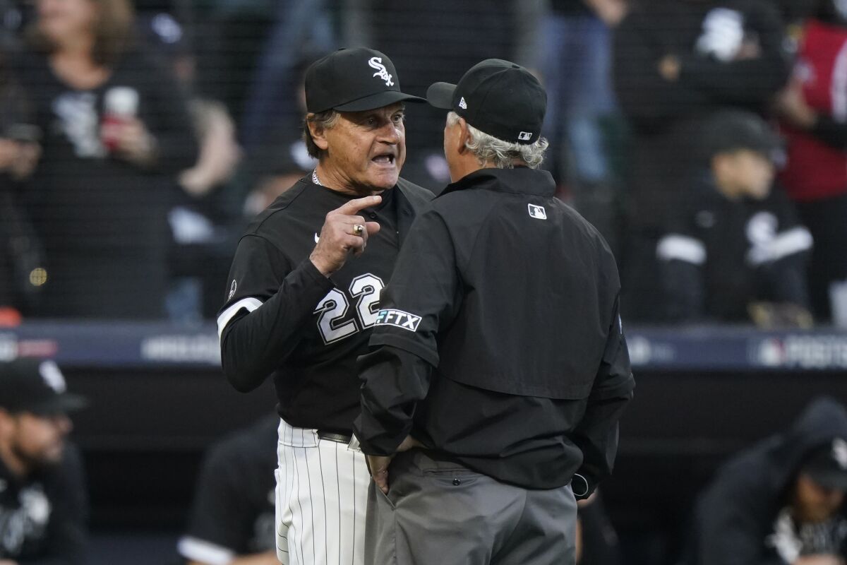 Chicago White Sox manager Tony La Russa argues with umpire Tom Hallion after Jose Abreu was hit by a pitch against the Houston Astros in the eighth inning during Game 4 of a baseball American League Division Series Tuesday, Oct. 12, 2021, in Chicago. (AP Photo/Nam Y. Huh)