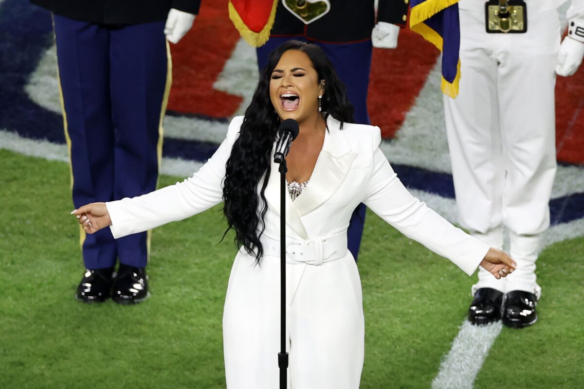Singer Demi Lovato performs the national anthem prior to Super Bowl LIV between the San Francisco 49ers and the Kansas City Chiefs at Hard Rock Stadium on February 2, 2020, in Miami, Florida