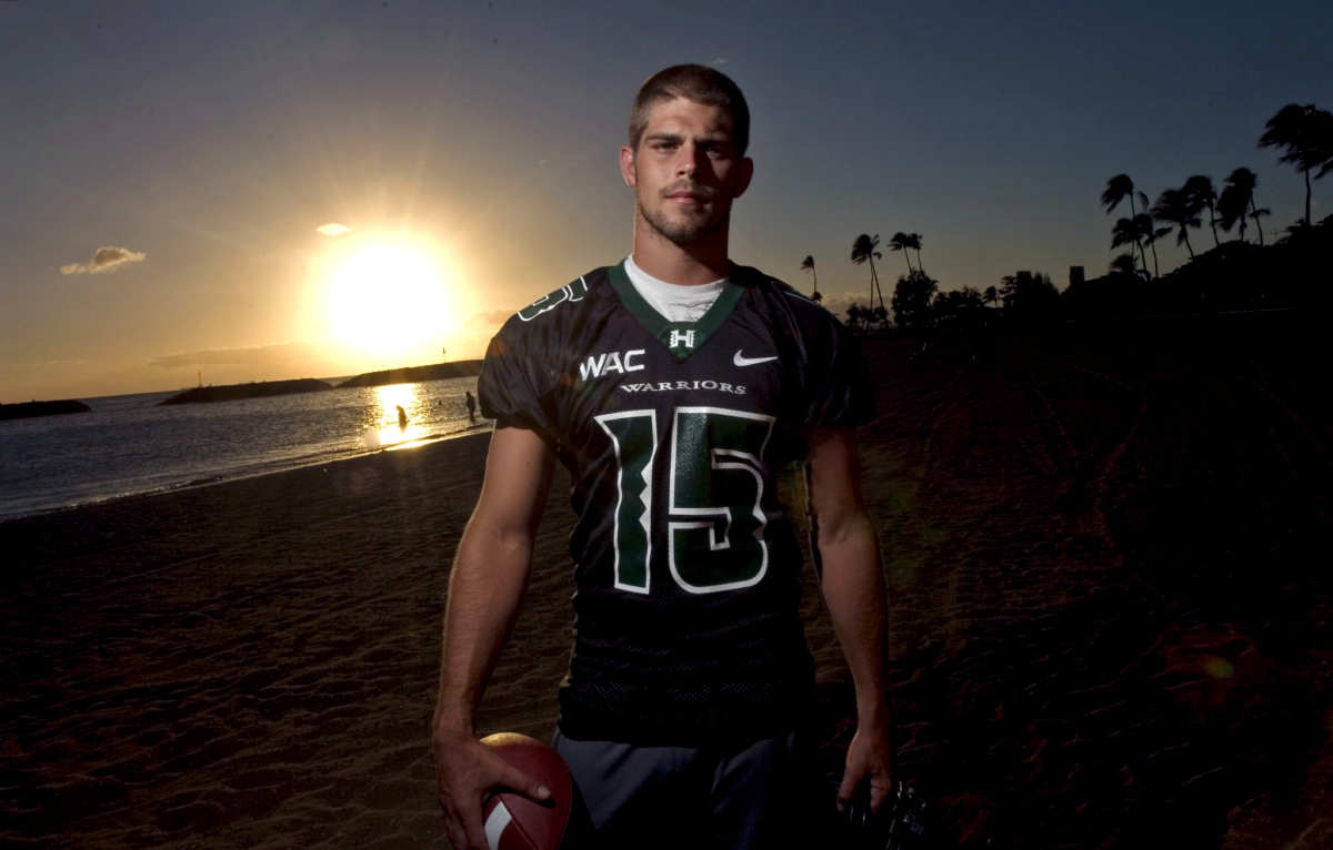 Quarterback Colt Brennan or the University of Hawaii Warriors poses for a photo on Waikiki Beach on Aug. 16, 2007.