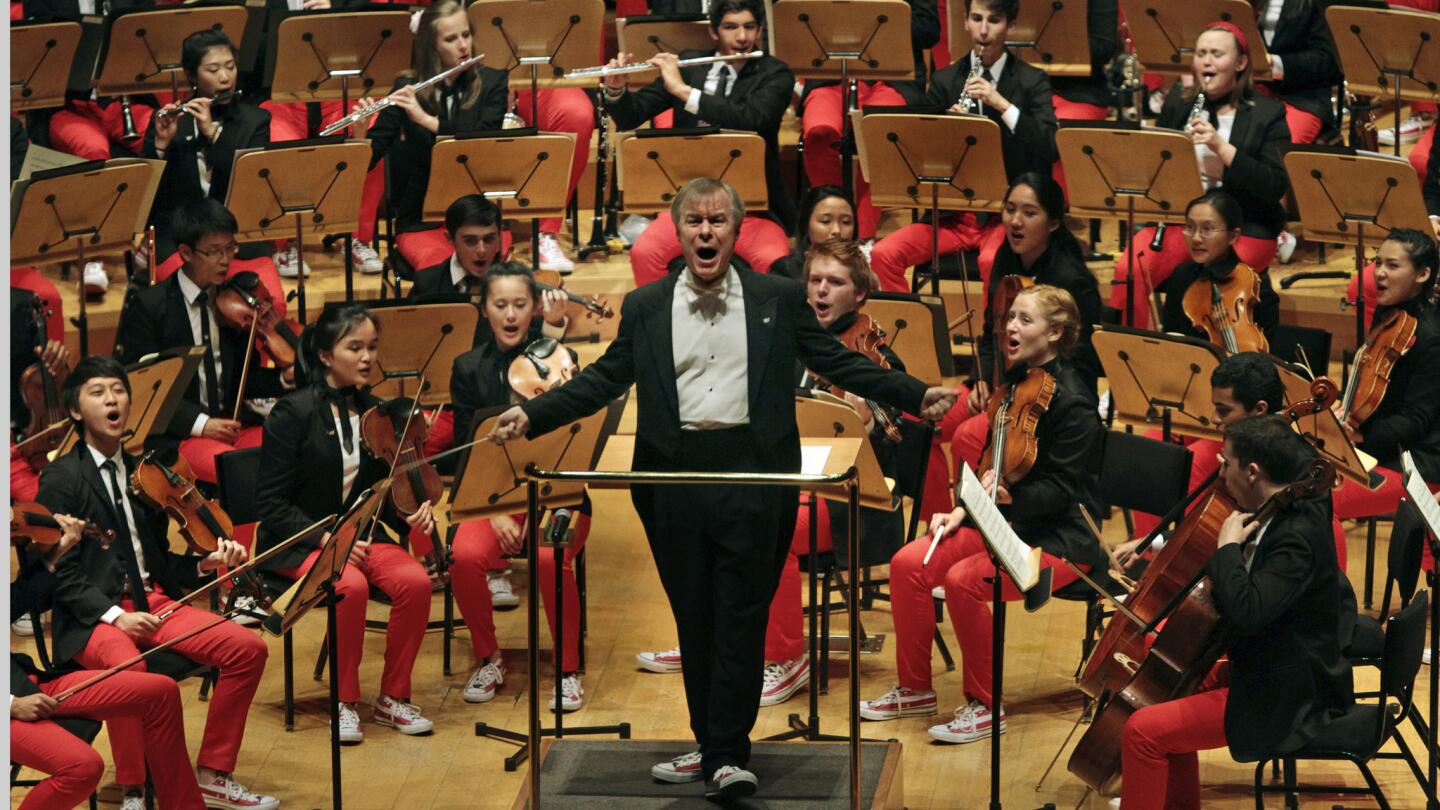 Conductor David Robertson's inspirational leading of the National Youth Orchestra at Walt Disney Concert Hall included joining the musicians in shouting "Mambo!" during the Symphonic Dances from "West Side Story."