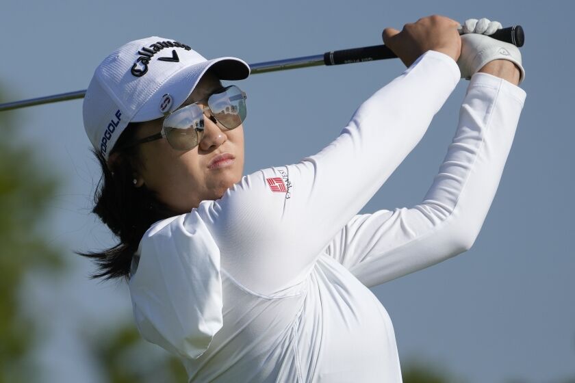 Rose Zhang hits off the second tee during the first round of the Mizuho Americas Open golf tournament, Thursday, June 1, 2023, at Liberty National Golf Course in Jersey City, N.J. (AP Photo/John Minchillo)