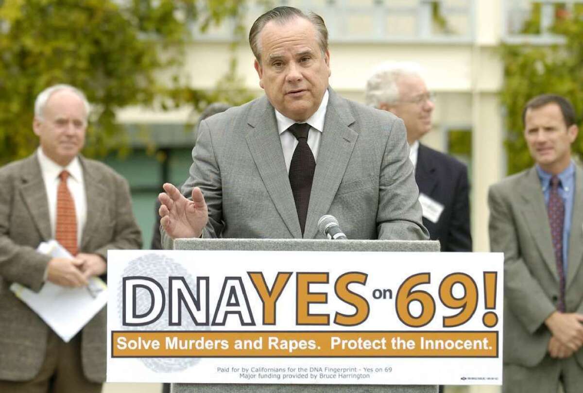 Then-California Atty. Gen. Bill Lockyer speaks in favor of Proposition 69 -- which authorized the collection DNA samples from anyone arrested in connection with a felony -- in 2004. The California law is now being challenged in federal courts.