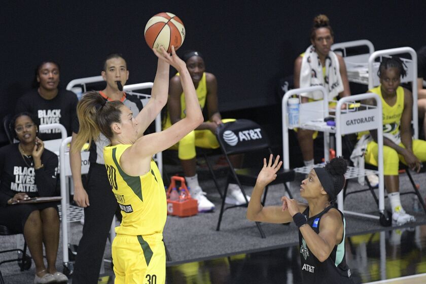 Seattle Storm forward Breanna Stewart (30) goes up for a shot in front of New York Liberty's Leaonna Odom, right, during the second half of a WNBA basketball game, Saturday, July 25, 2020, in Ellenton, Fla. (AP Photo/Phelan M. Ebenhack)
