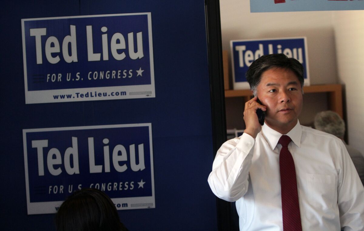After changing his phone number, Rep. Ted Lieu, shown in this 2014 file photo, discovered a surprising downside to two-factor authentication. Whoever wound up with his old phone number likely received log-in prompts linked to his account.