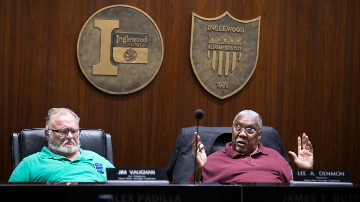 Inglewood Citizen Police Oversight Commission Vice Chairman Jim Vaughan, left, and Chairman Lee Denmon attend an Oct. 12, 2016, meeting at Inglewood City Hall.