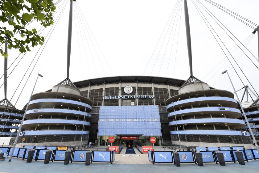 FILE - A exterior shot of the stadium before the English Premier League soccer match between Manchester City and Arsenal at the Etihad Stadium in Manchester, England, Wednesday, June 17, 2020. Manchester City has been accused of numerous breaches of the Premier League's financial regulations between 2009-18. The period covers the first nine full seasons under the club’s Abu Dhabi ownership. City won the league on three occasions during that time in 2012, 2014 and 2018. (Peter Powell/Pool via AP, File)