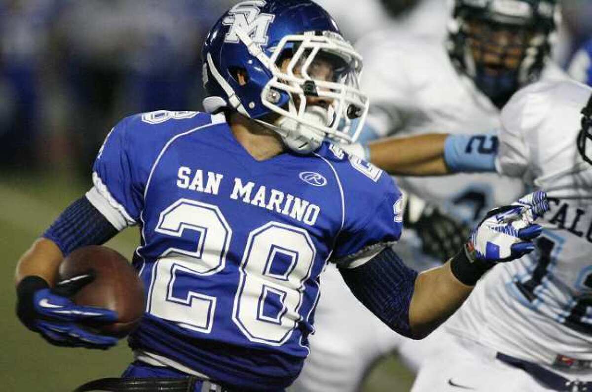 San Marino's Andrew Cordova carries the ball against Crescenta Valley.