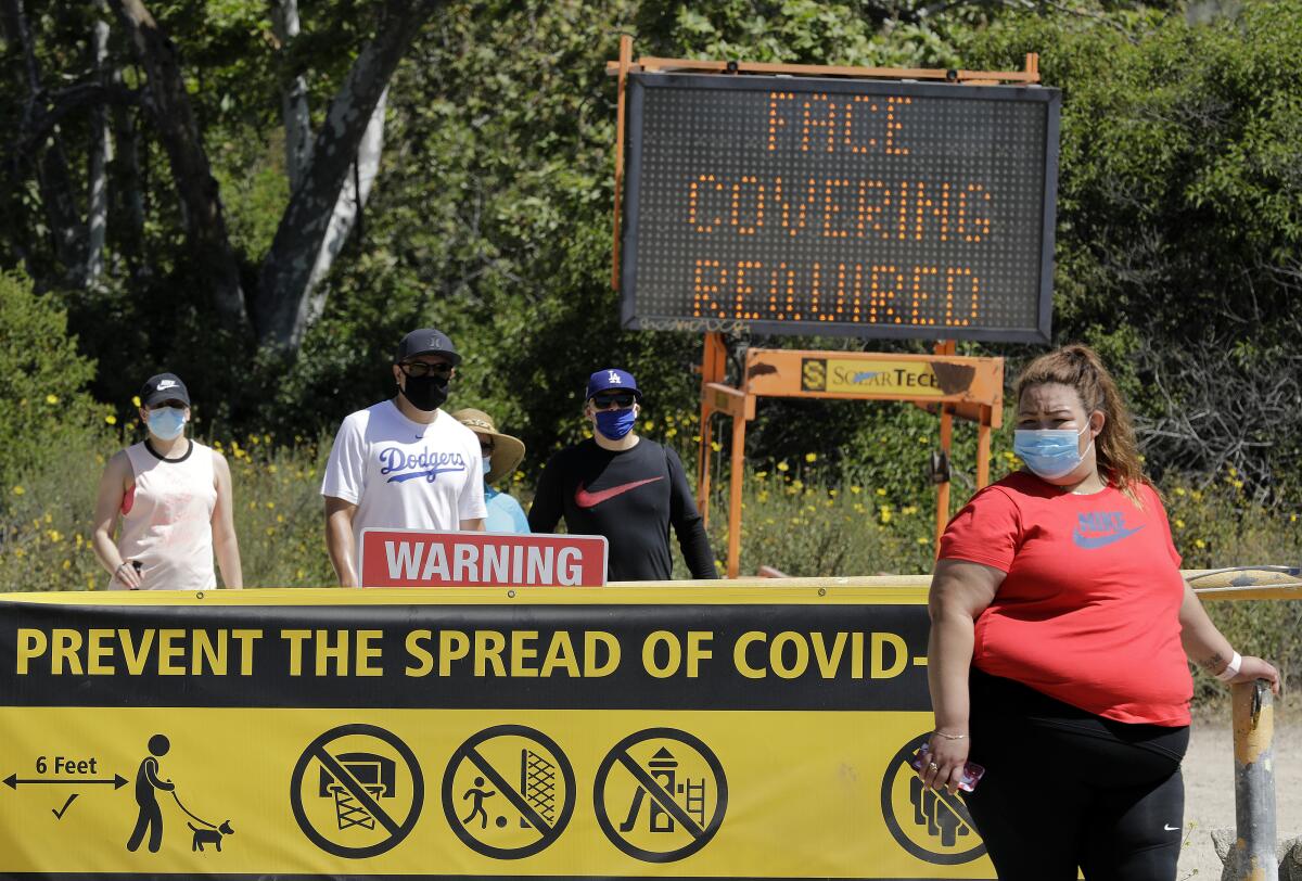 Signs at Eaton Canyon Natural Area Park in Pasadena. 
