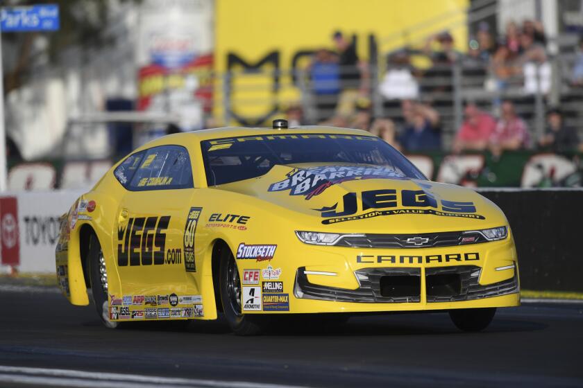 In this photo provided by the NHRA, Five-time Pro Stock world champion Jeg Coughlin rockets to the No. 1 qualifier position at the annual Lucas Oil NHRA Winternationals at Auto Club Raceway, Pomona, Calif., Saturday, Feb. 8, 2020. (Marc Gewertz/NHRA via AP)/NHRA via AP)