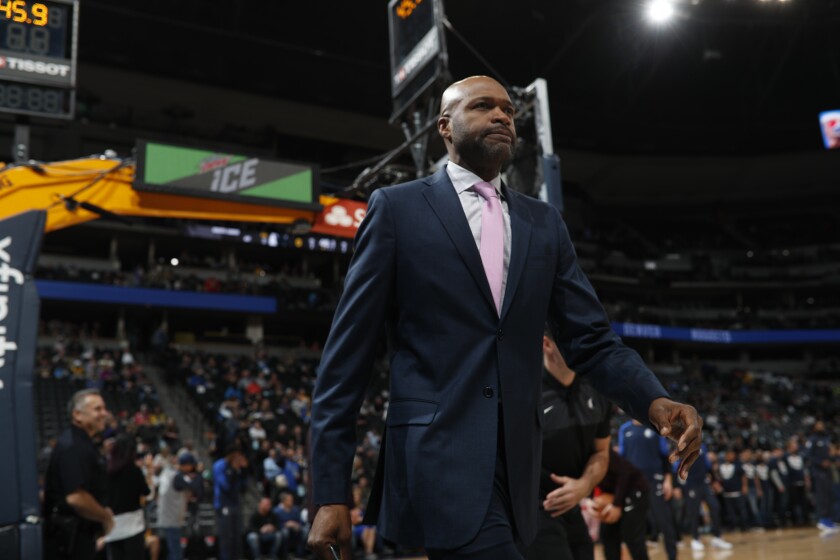 Dallas Mavericks assistant coach Jamahl Mosley in the first half of an NBA basketball game Tuesday, Dec. 18, 2018, in Denver. The Orlando Magic finalized a deal Sunday, July 11, 2021 to make Mosley the 14th coach in franchise history. (AP Photo/David Zalubowski)