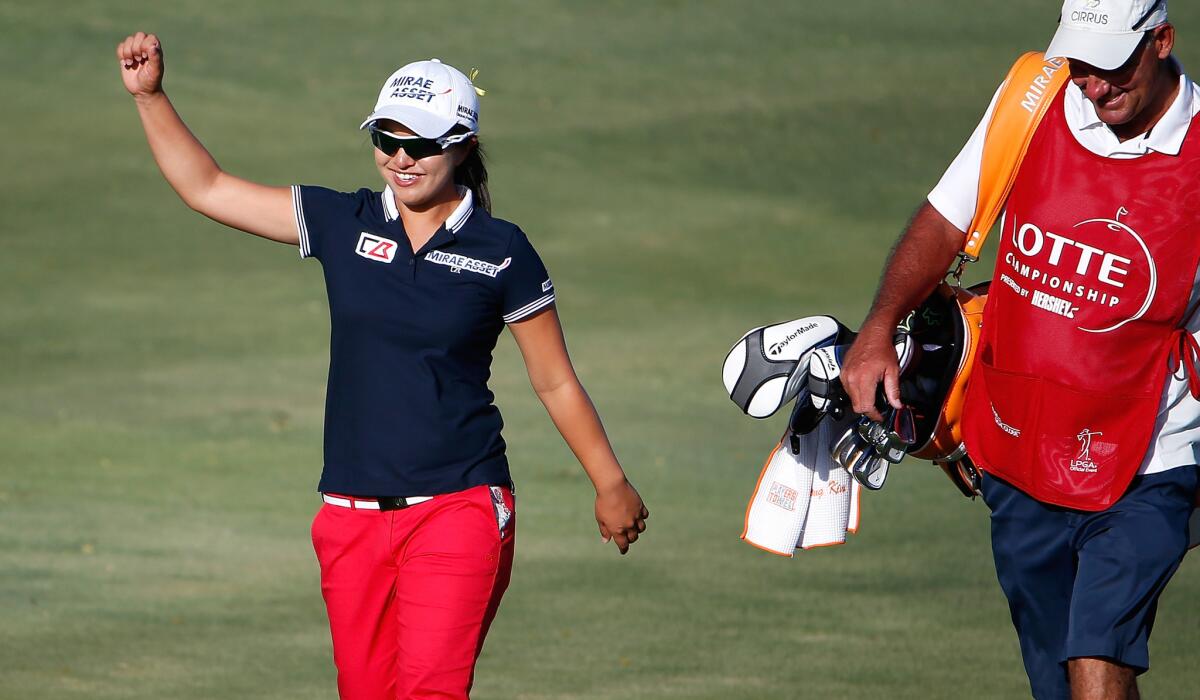 Sei Young Kim as she walks up to the 18th green after scoring an eagle on the first playoff hole to win the Lotte Championship on Saturday.