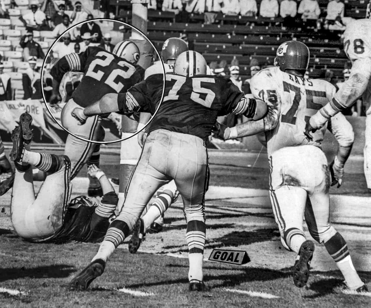 Jan. 15, 1967: Packers' Elijah Pitts, 22, scores on five-yard run early in the third quarter. Packers' Forrest Gregg, 75, and Chiefs' Jerry Mays, 75, follow the action during Super Bowl game at Los Angeles Memorial Coliseum.