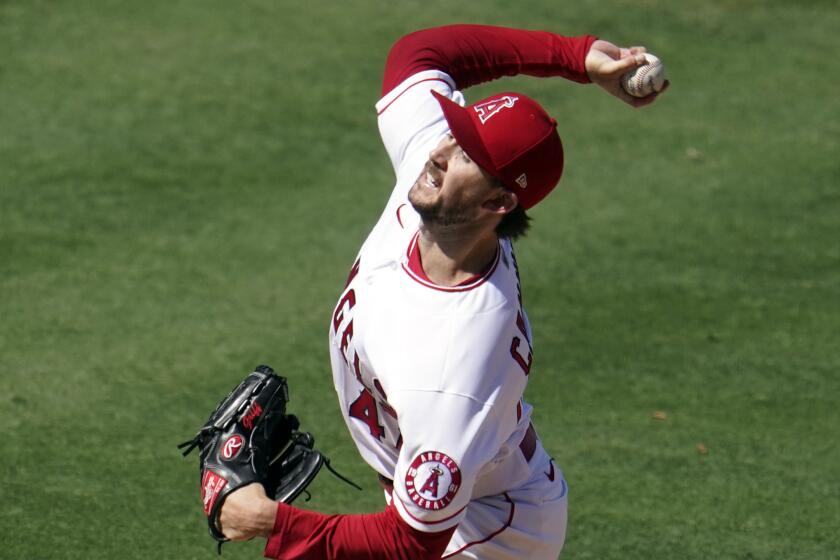Los Angeles Angels starting pitcher Griffin Canning throws to the Arizona Diamondbacks.