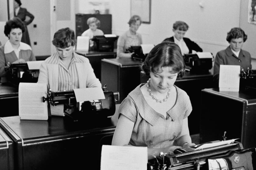 Typists at work at Unilever House in Blackfriars, London, September 1955. Original Publication: Picture Post - 8002 - Leave Youth Alone - pub. 24th September 1955 (Photo by Bert Hardy/Picture Post/Hulton Archive/Getty Images)