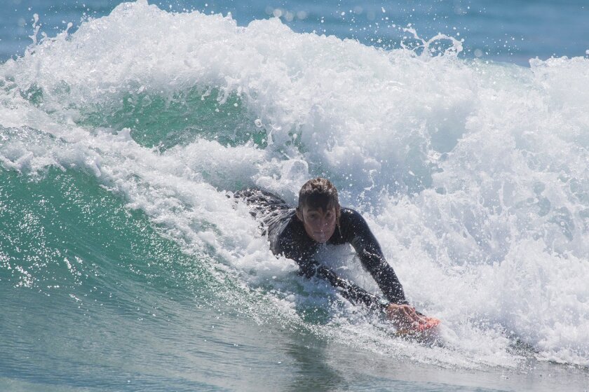 Meredith Rose in action at Huntington Beach. Rose won the 20-plus age group in Handplaning and placed third in Bodysurfing. Courtesy photo
