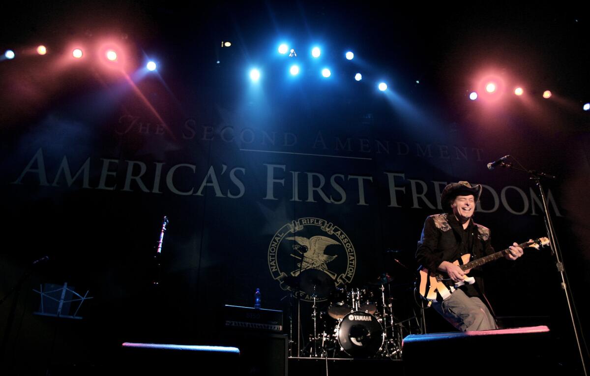 Ted Nugent, seen during the opening ceremony of a National Rifle Association annual convention, will attend this year's State of the Union address.