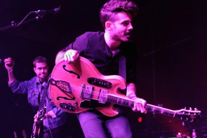Ryan Hahn, left, and Taylor Rice of the L.A. band Local Natives play to a sold-out show at the Fonda in Hollywood. Read the review.