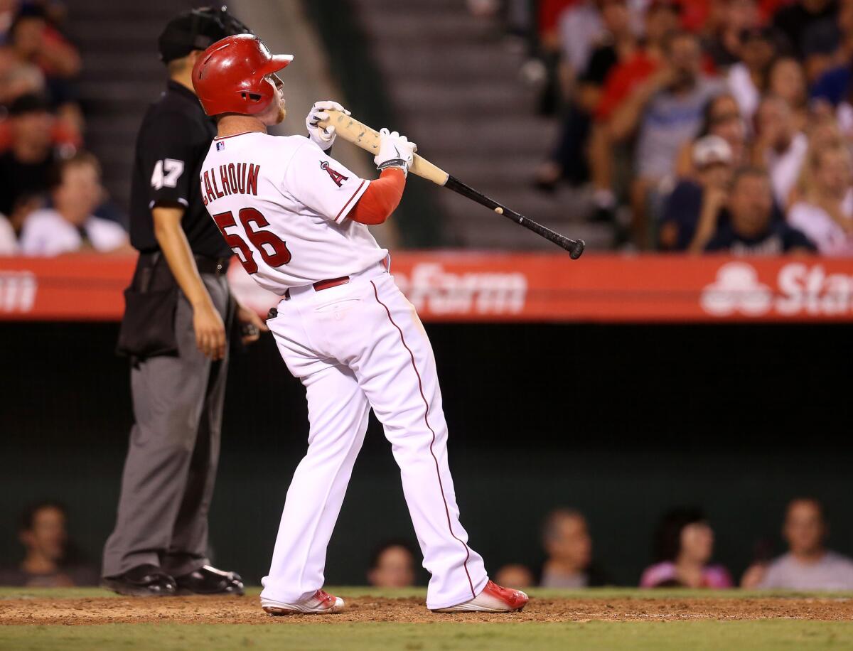 Kole Calhoun reacts after his check swing was ruled a strike on appeal by the third base umpire.
