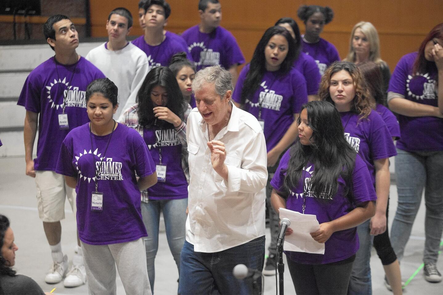Artistic director Bill Brawley, center, instructs a group of teenagers during a Summer at the Center program on Wednesday.