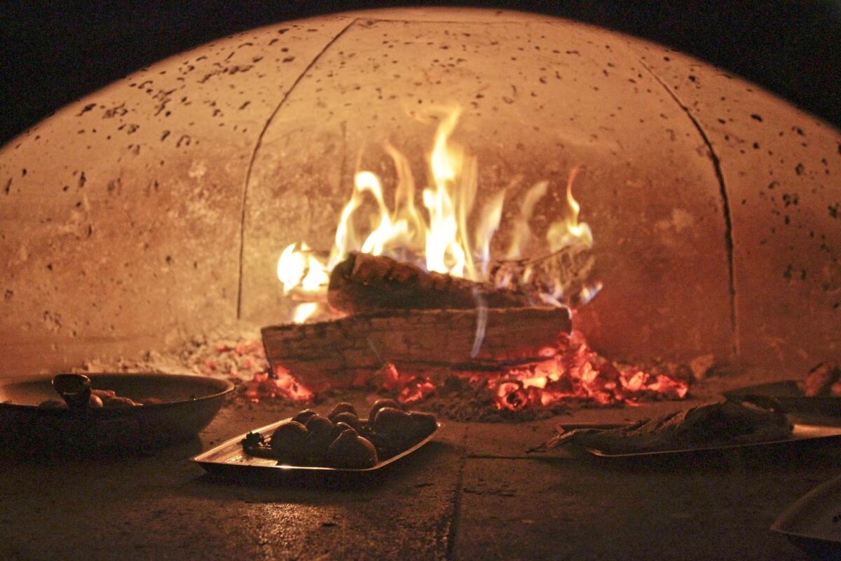 Wood oven at Tar & Roses restaurant.