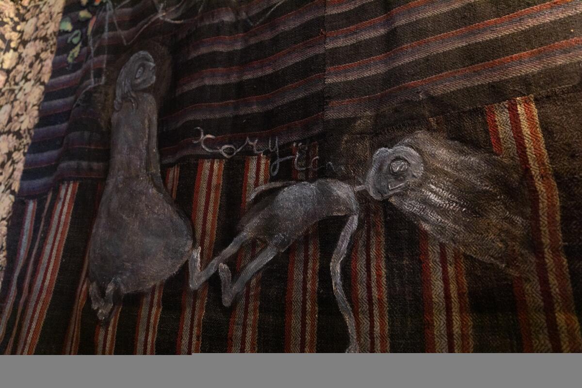 A closeup of IraVish’s acrylic homespun carpet art piece “Want to Eat” is seen on display at the “HeART and Soul of Ukraine."