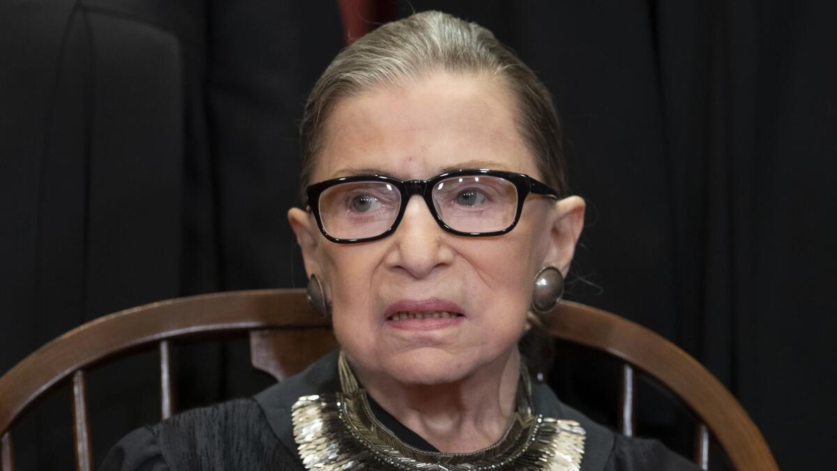 Justice Ruth Bader Ginsburg during a group portrait at the Supreme Court in Washington on Nov. 30, 2018.