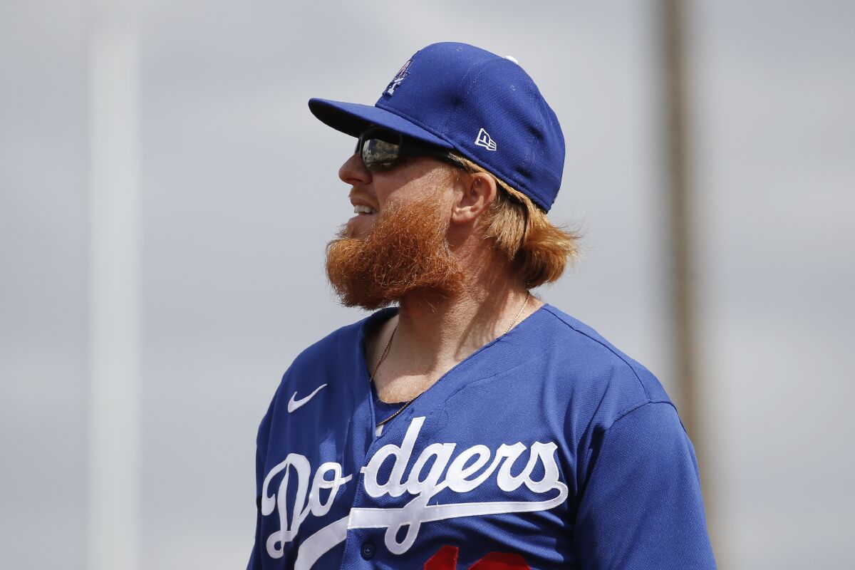 Dodgers third baseman Justin Turner watches a foul ball during a spring training game against the Reds on March 2 in Goodyear, Ariz.