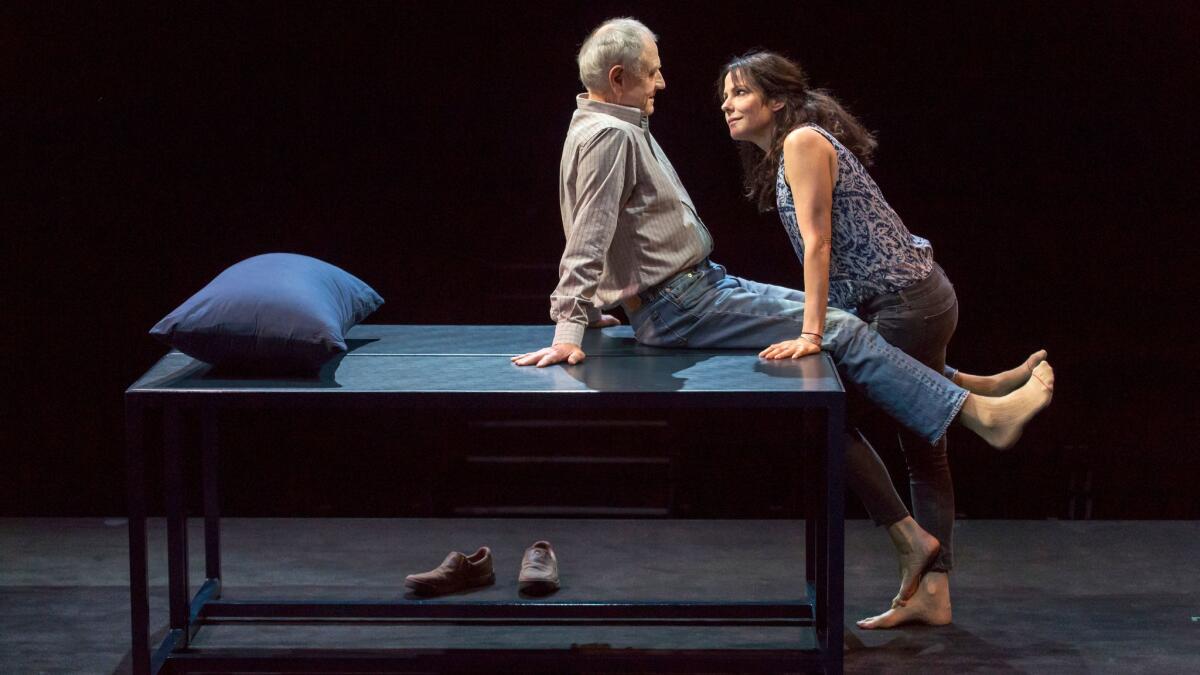 Denis Arndt and Mary-Louise Parker on the stark set of "Heisenberg" at the Mark Taper Forum.