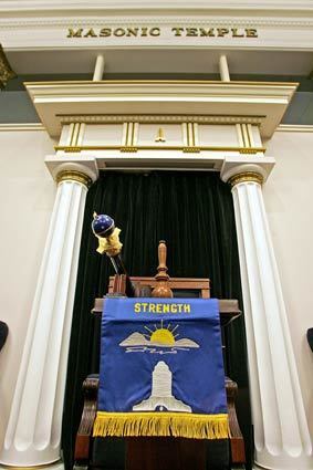 The interior of the lodge room at Santa Monica-Palisades Lodge No. 307 displays the regalia used in meetings. Pictured here is a banner embroidered with the word strength, considered one of the "three pillars" of Freemasonry (the other two are wisdom and beauty). More... • Freemasons gain a higher, hipper profile Also in Image: • The Big Deal: Shoe bargains to get lost in • Hey Dodger fans: True Blue tattoo shop, Los Feliz • Bob Mackie reunites with Cher • Cher through the years - dressed by Bob Mackie • Meet the millennial Masons • Stylish Masons through history