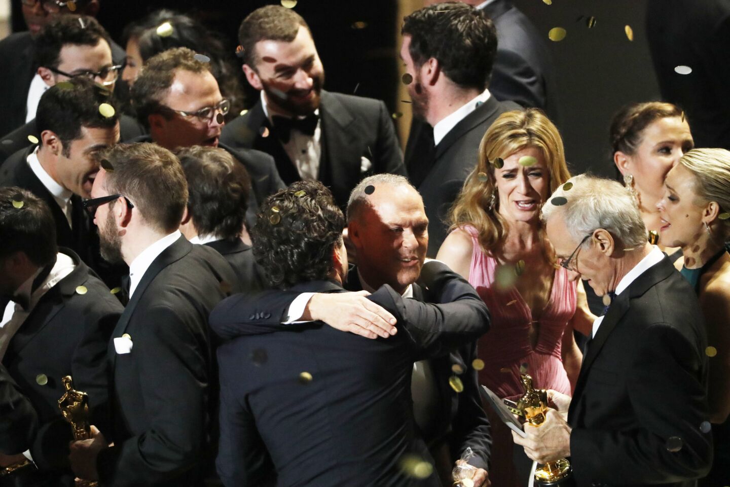 Michael Keaton and the cast and producers of "Spotlight" celebrate after winning the Oscar for best picture.