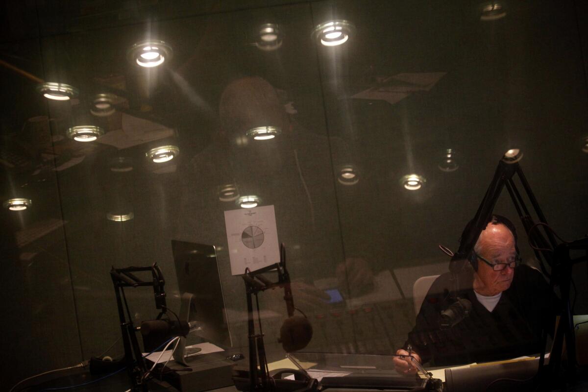 Warren Olney, shown at the KCRW-FM (89.9) station on the Santa Monica College campus in 2014, has hosted local public affairs show "Which Way, L.A." for 23 years. The program will end Jan. 28, though Olney will continue to host his other daily public radio show, "To the Point."