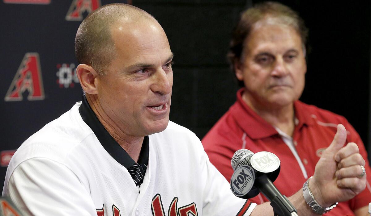 Chip Hale, alongside Chief Baseball Officer Tony La Russa, fields questions from the media as he's introduced as the manager of the Arizona Diamondbacks on Oct. 13, 2014.