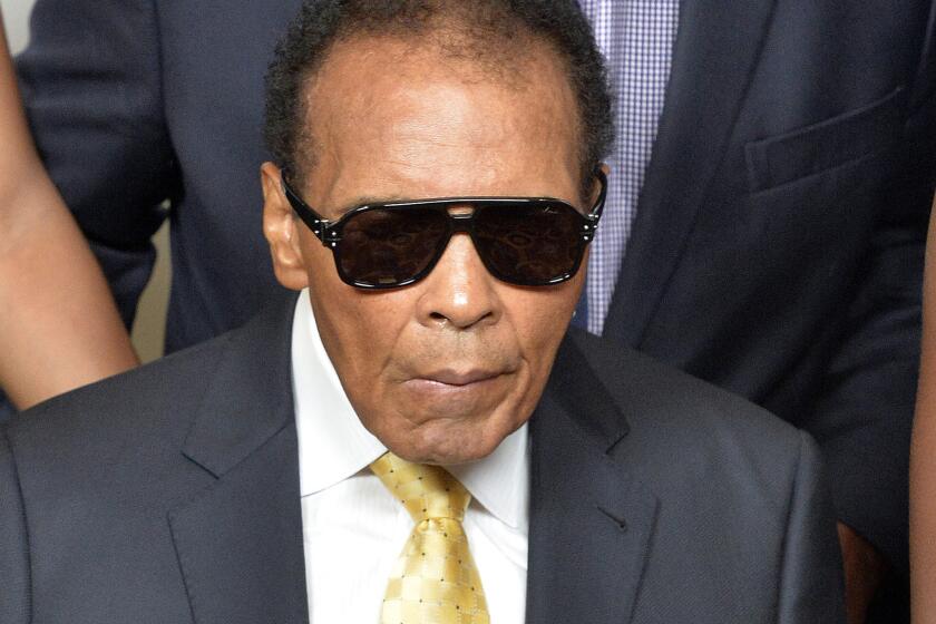 Muhammad Ali, shown in September, was released from a Kentucky hospital Friday after receiving follow-up care related to a urinary tract infection.