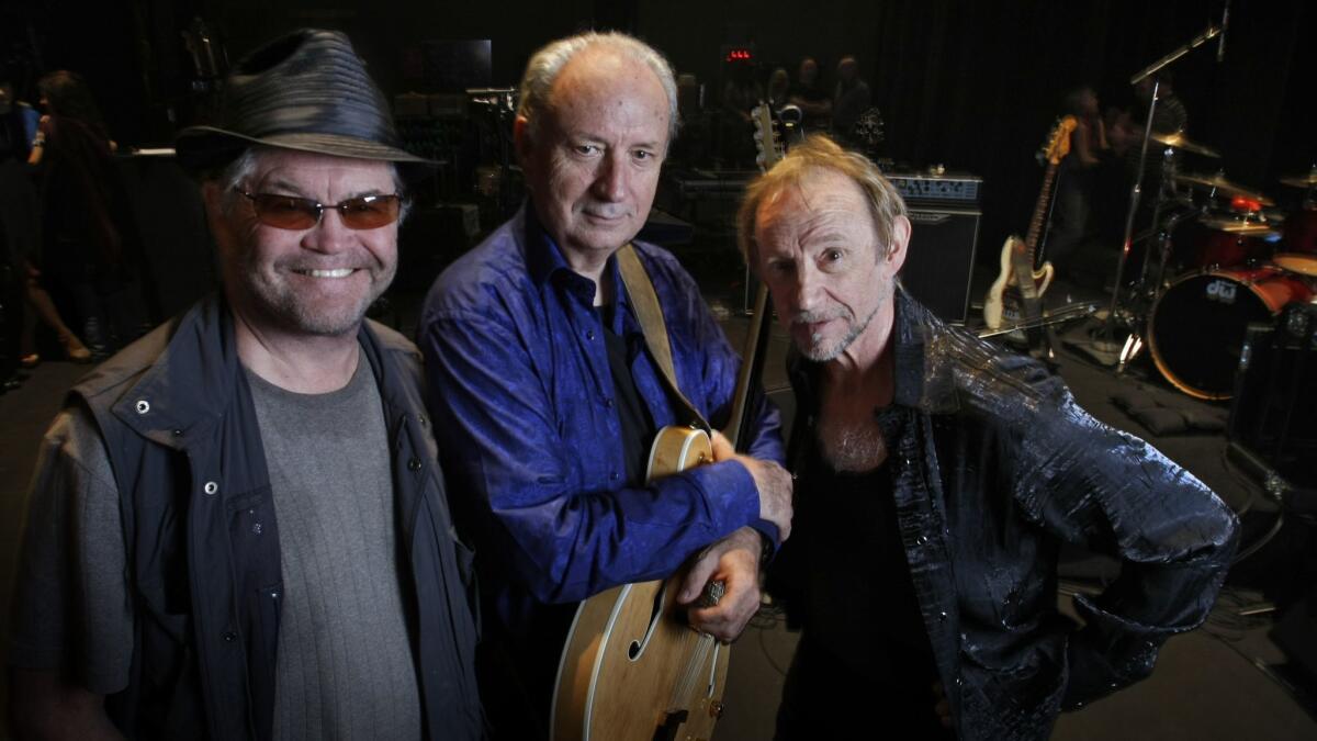 The then-surviving Monkees, from left, Micky Dolenz, Michael Nesmith and Peter Tork reunited in 2012 after the death of singer Davy Jones.