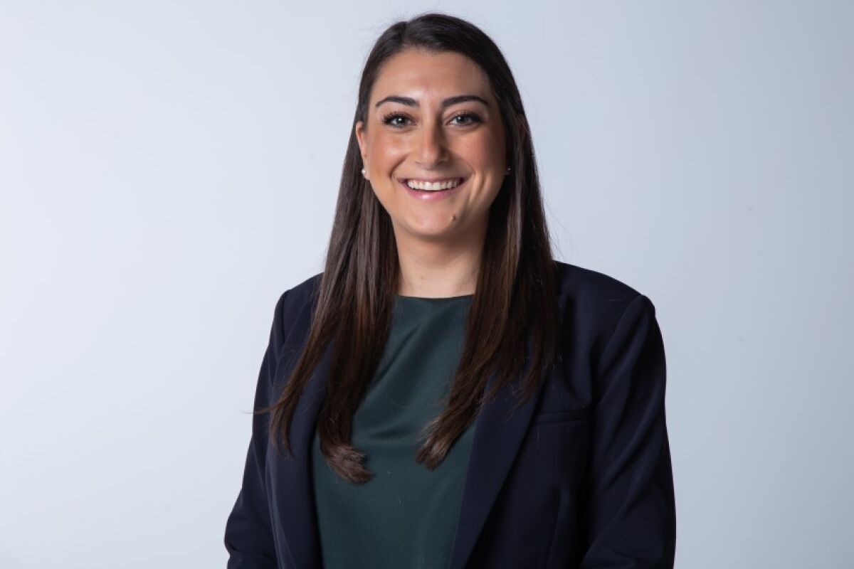 Congressional candidate Sara Jacobs poses for a portrait in December 2019 .