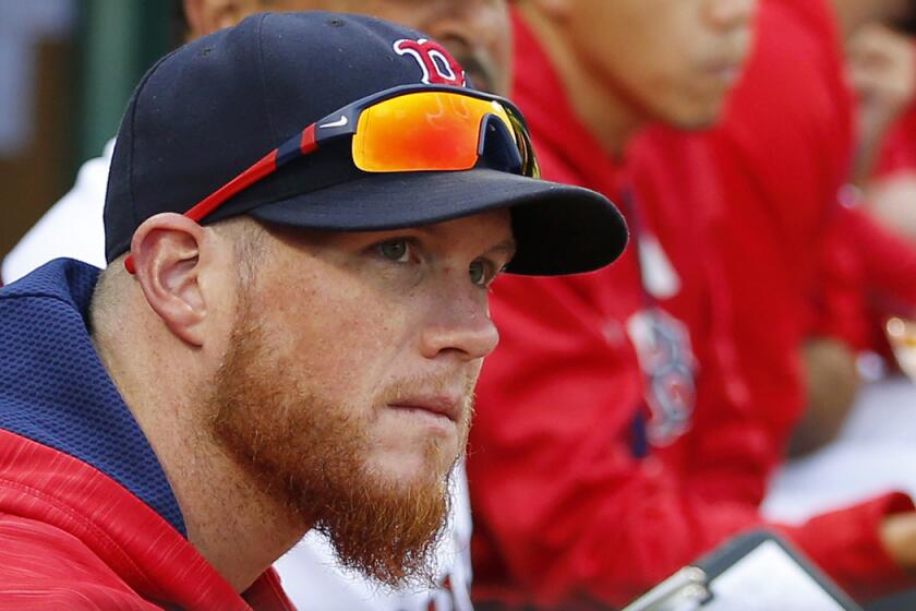 Boston Red Sox relief pitcher Craig Kimbrel looks on from the dugout during the eighth inning against the Tampa Bay Rays on Saturday.