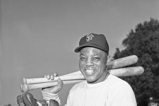 Willie Mays, star outfielder for the San Francisco Giants, arrives on Feb. 4, 1962 at a San Francisco public playground 