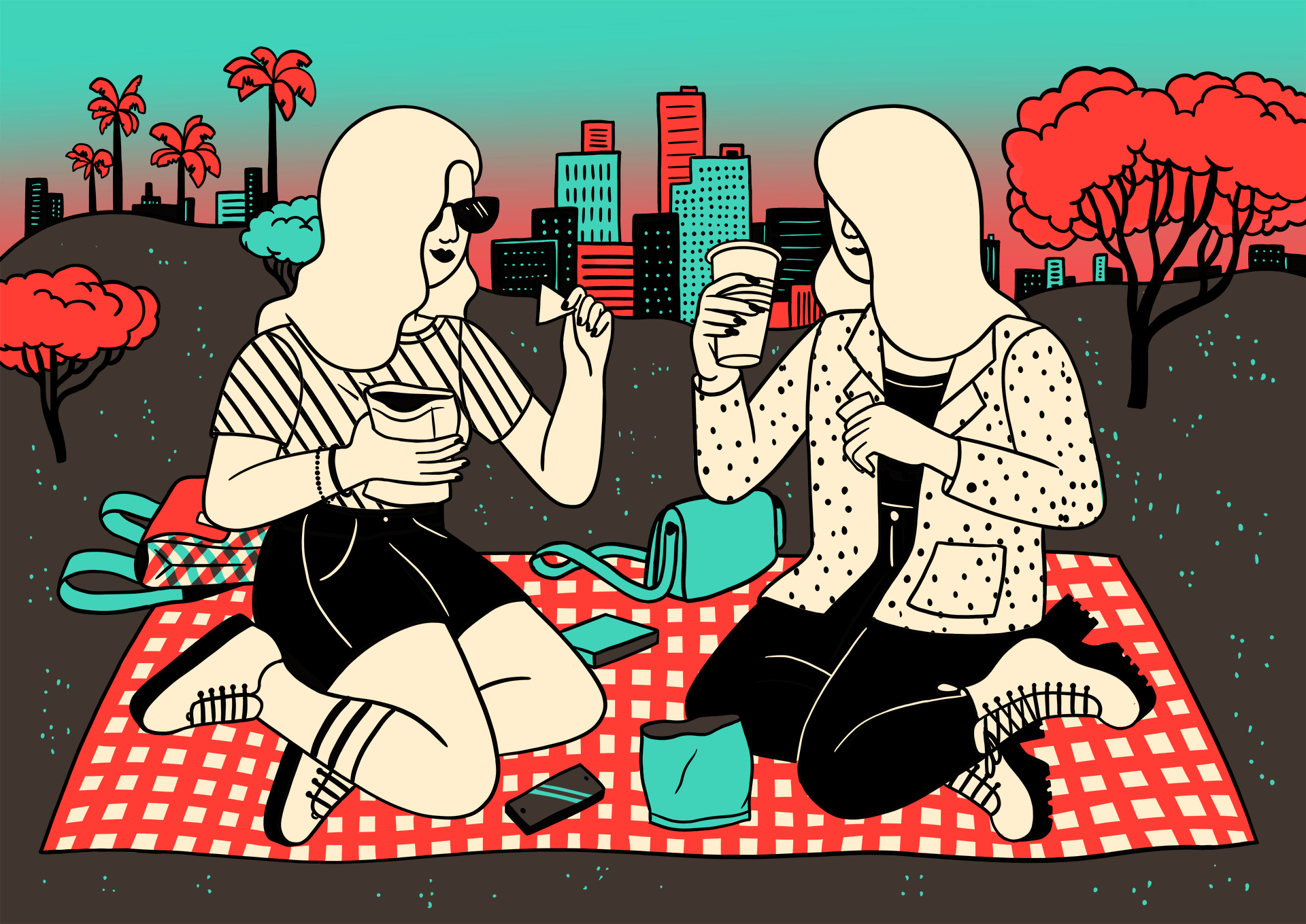 Two women enjoy a picnic in a park with the Los Angeles skyline behind them.