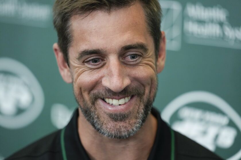 New York Jets' quarterback Aaron Rodgers talks to reporters after a news conference at the Jets' training facility in Florham Park, N.J., Wednesday, April 26, 2023. (AP Photo/Seth Wenig)
