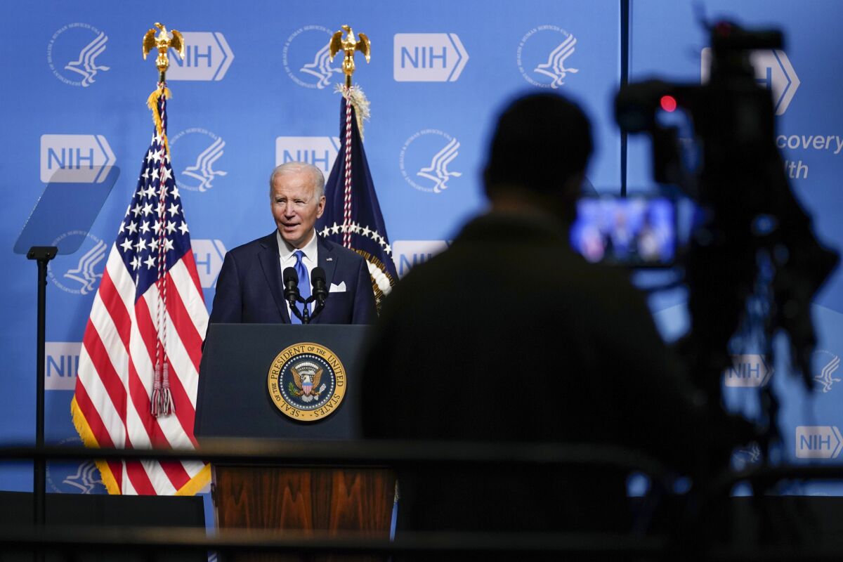 President Biden speaks about COVID-19 at the National Institutes of Health on Thursday.