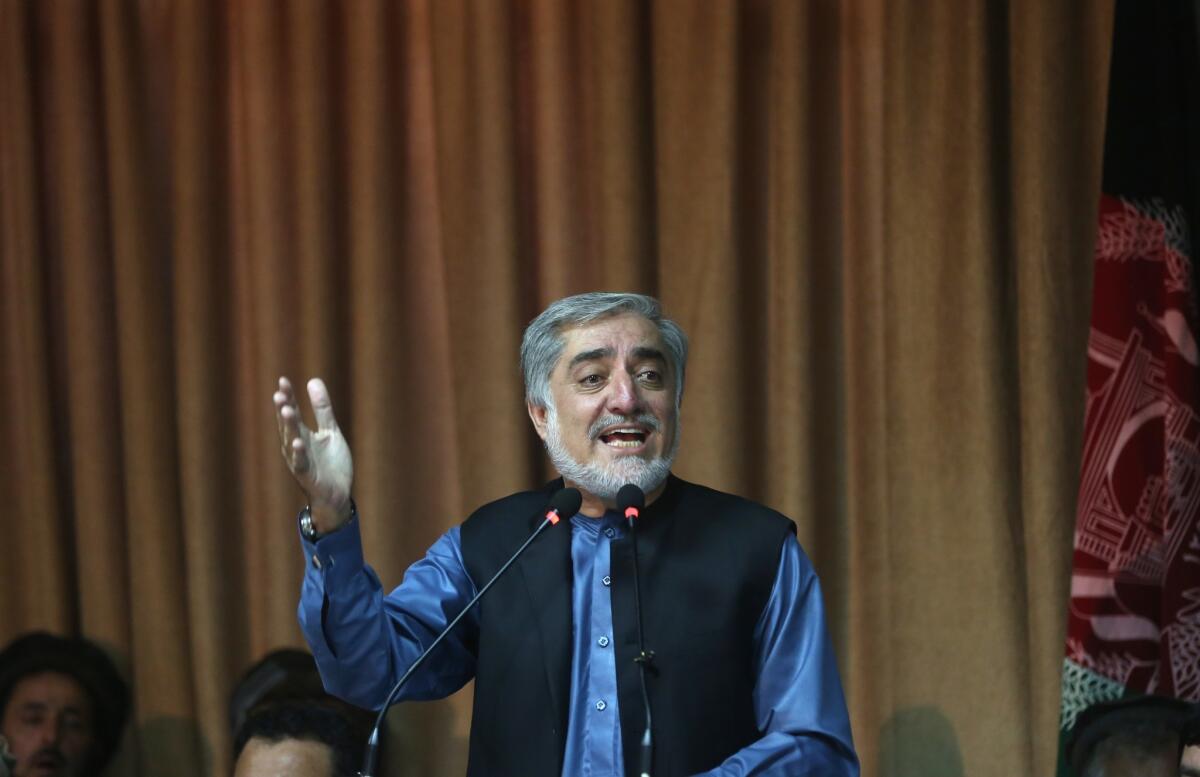 In this Sept. 8 file photo, Afghan presidential candidate and former Foreign Minister Abdullah Abdullah speaks during a news conference in Kabul, Afghanistan.