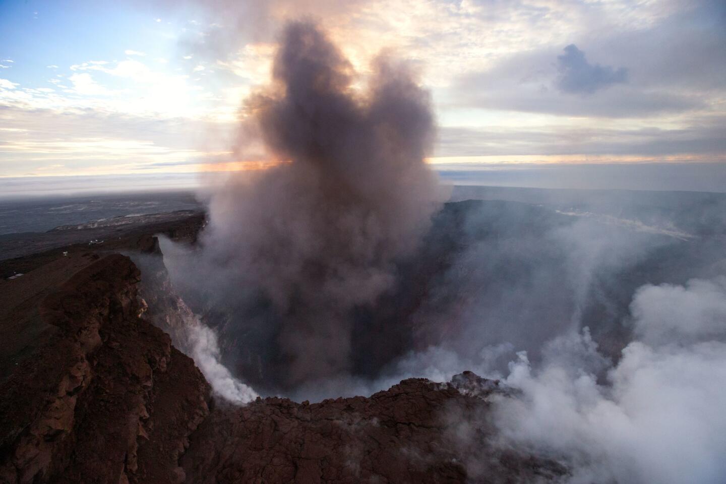 An aerial view shows smoke rising from the Puu Oo crater on the Big Island of Hawaii.